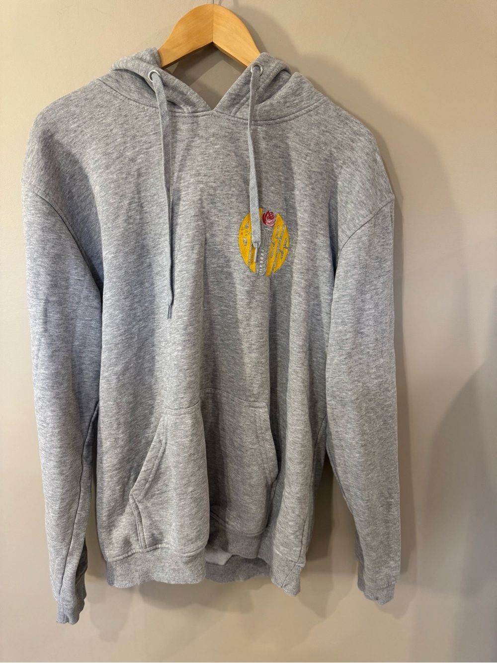 Gray Pullover Hoodie with Subtle Chest Logo